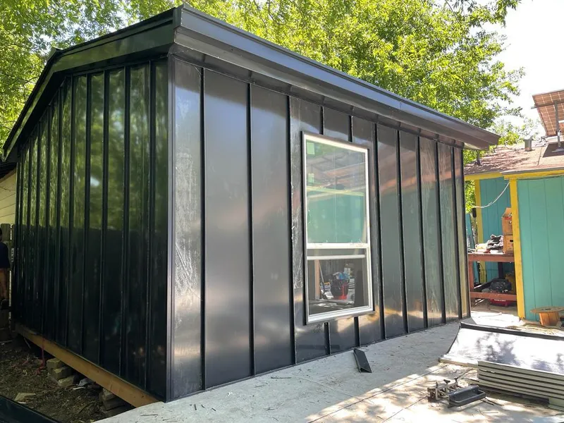 Black standing seam metal wall panels for Metal Roof Installation in Benton